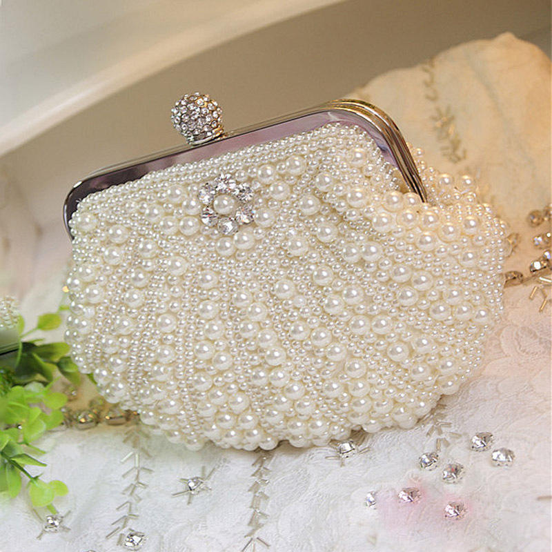 Luxury Scalloped Pearl Clutch  - Luxury Bags Direct recension och pris