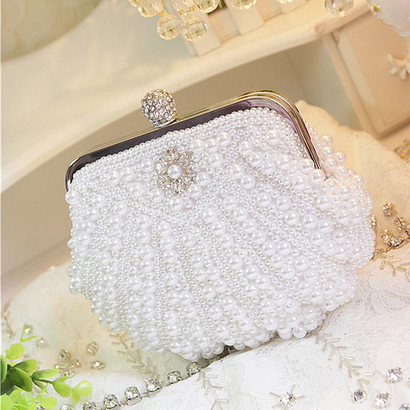 Luxury Scalloped Pearl Clutch  - Luxury Bags Direct recension och pris
